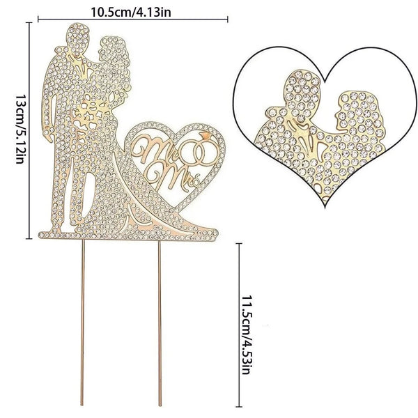 A crystal rhinestone Mr & Mrs wedding cake topper featuring a couple silhouette and monogram on a wooden stick.