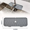 A silicone kitchen sink drainer and splash guard mat with a slotted design shown in close-up.