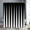 Black and white abstract geometric line shower curtain hanging on a rod