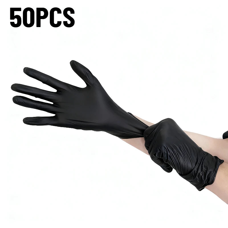 A hand wearing a black disposable nitrile cleaning glove is shown against a white background.