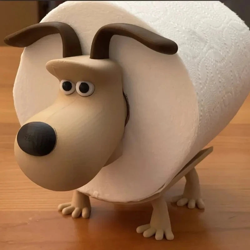 A decorative toilet paper holder shaped like a dog with brown ears and light tan fur.