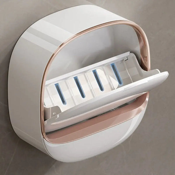 A white wall mounted waterproof soap dish with a removable tray is shown in a close-up view.