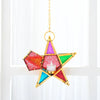 Forged iron star hanging candlestick with multicolored glass facets suspended by a gold chain