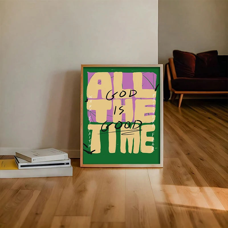 A framed canvas art print with the quote All God Is The Good Time in yellow and purple on a green background