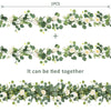 A long garland of artificial eucalyptus leaves and white roses, suitable for floral arrangements.