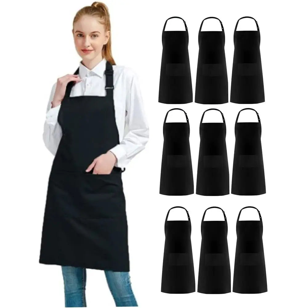 A woman wearing a classic black chef apron with a large front pocket.