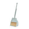 A silver toddler mini broom and dustpan set with a handle and brush.