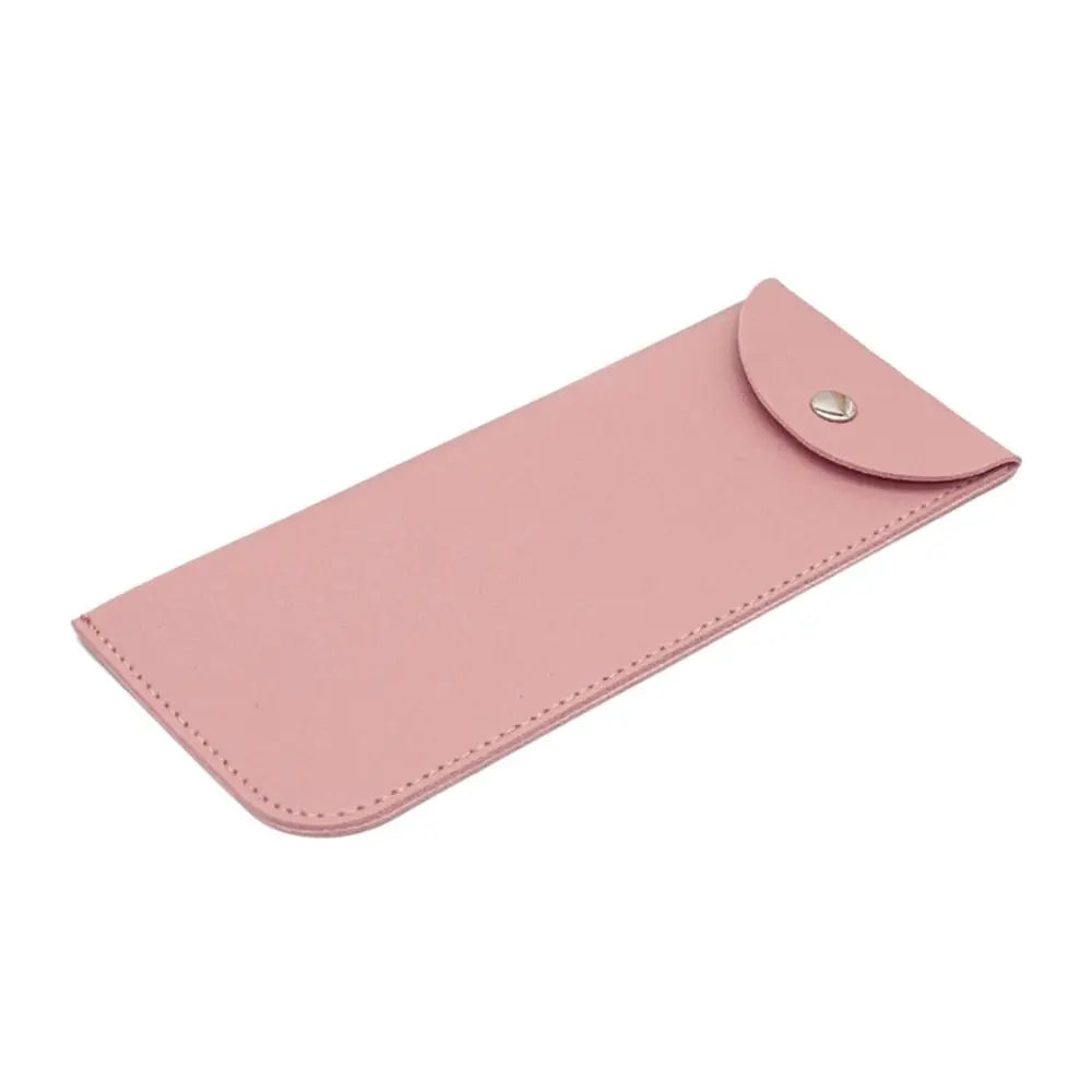 A pink PU leather eyewear case or glasses bag with a flap closure.