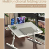 Mesa plegable multifuncional con una laptop, diseñada para almacenamiento cómodo y vida tranquila.