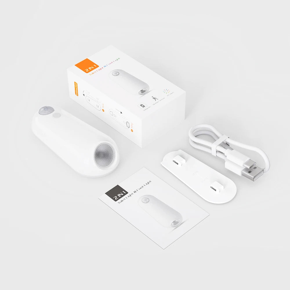 A white motion sensor night light device shown with its packaging and accessories.