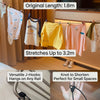 A set of retractable J-hooks used for hanging clothes on a rail, demonstrating stretch and versatility.