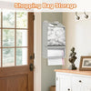 A silver wall-mounted organizer for storing shopping bags, featuring mesh compartments and a fabric pouch.