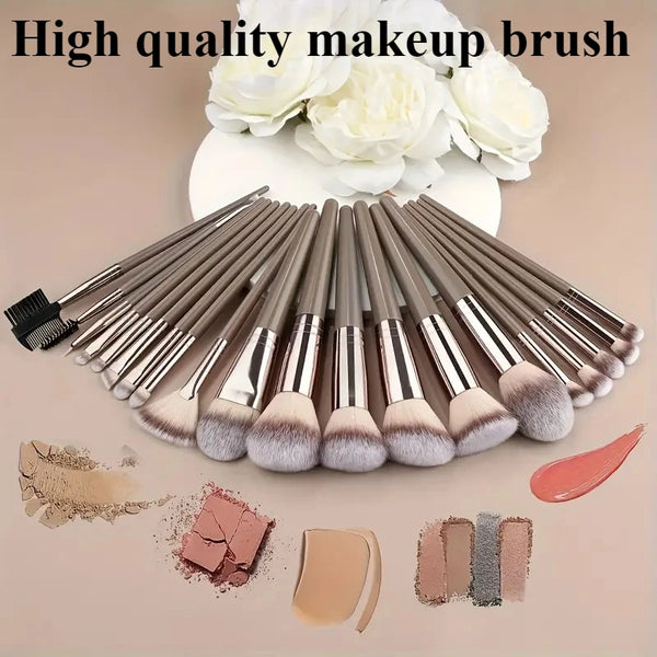 A set of high quality makeup brushes and various cosmetic products displayed on a neutral background.