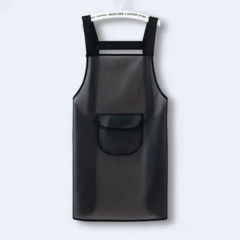 A black waterproof transparent kitchen apron hanging on a hanger.