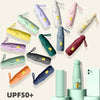 A collection of various colored folding UV protection umbrellas displayed against a light background.