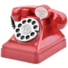 A red retro telephone shaped like a money jar with a cutout saying Girlwill I Miss You!