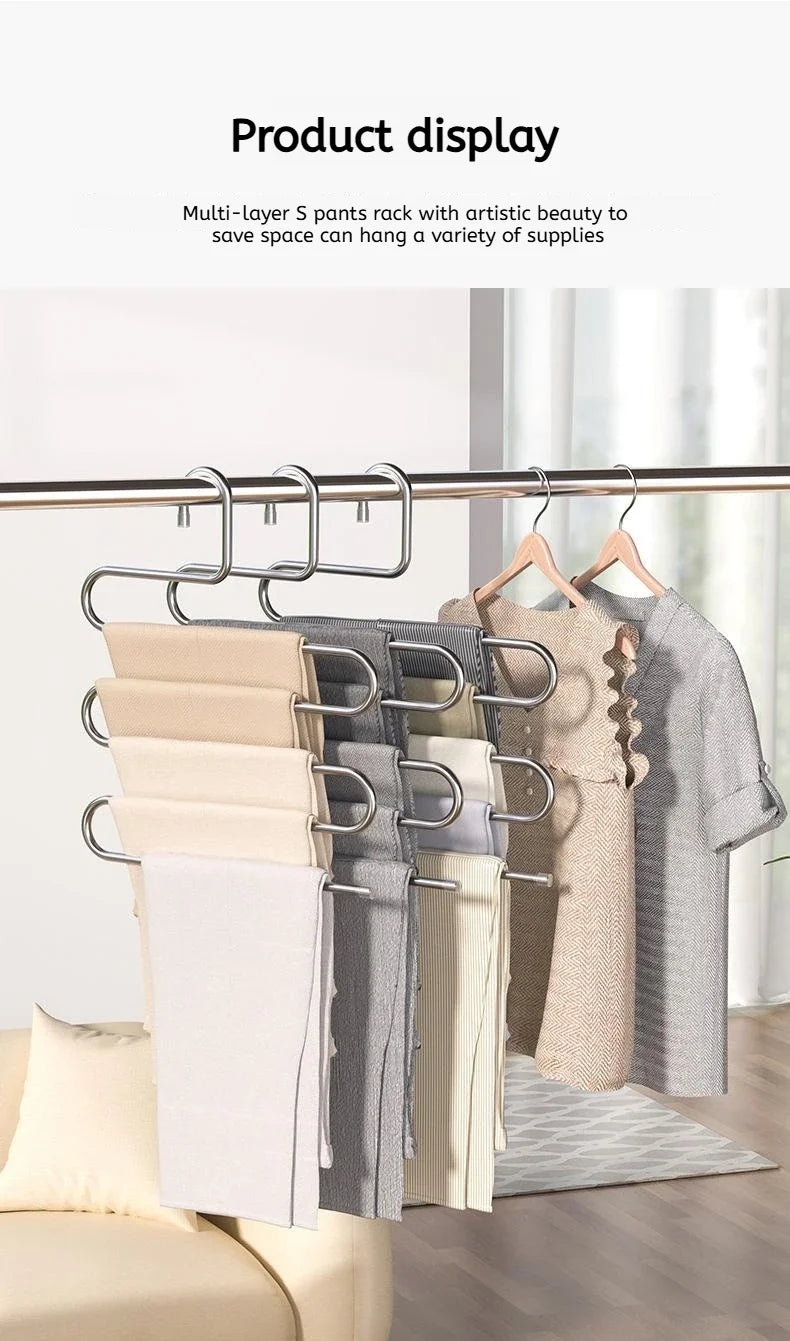 Multi-layer stainless steel pants rack displaying various folded clothing items hanging on a rod.