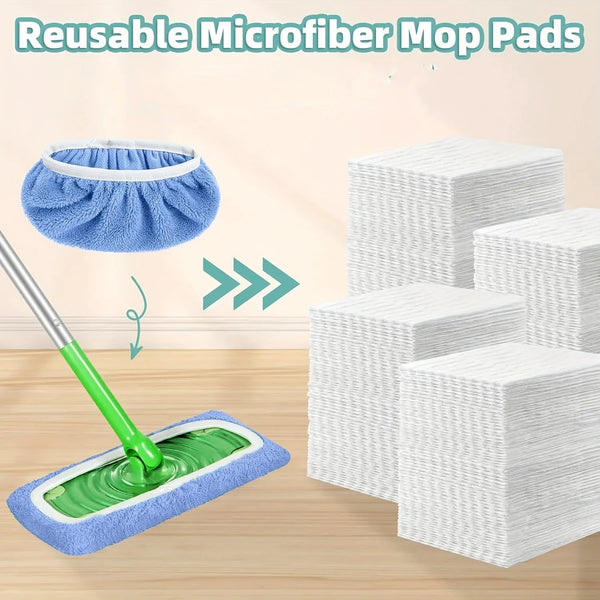 Stack of blue and white microfiber mop pads with a green mop visible on a wooden floor.
