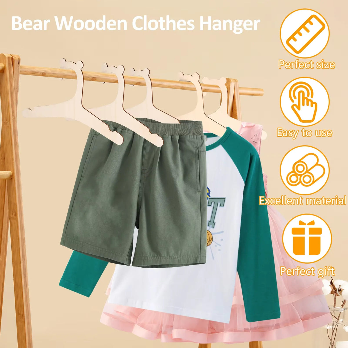 A wooden clothes hanger displaying various garments, including shorts and a shirt, on a wooden rack.