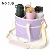 Sac isotherme violet avec porte-gobelet en silicone et thermos en métal.