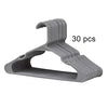 A set of thirty gray plastic clothes hangers designed for eco-friendly use.