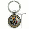 Silver keychain featuring a round medallion depicting the Saint Michael Archangel.