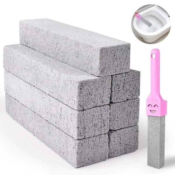 A stack of gray pumice cleaning scrubbers with a pink handle and a small bowl for cleaning.