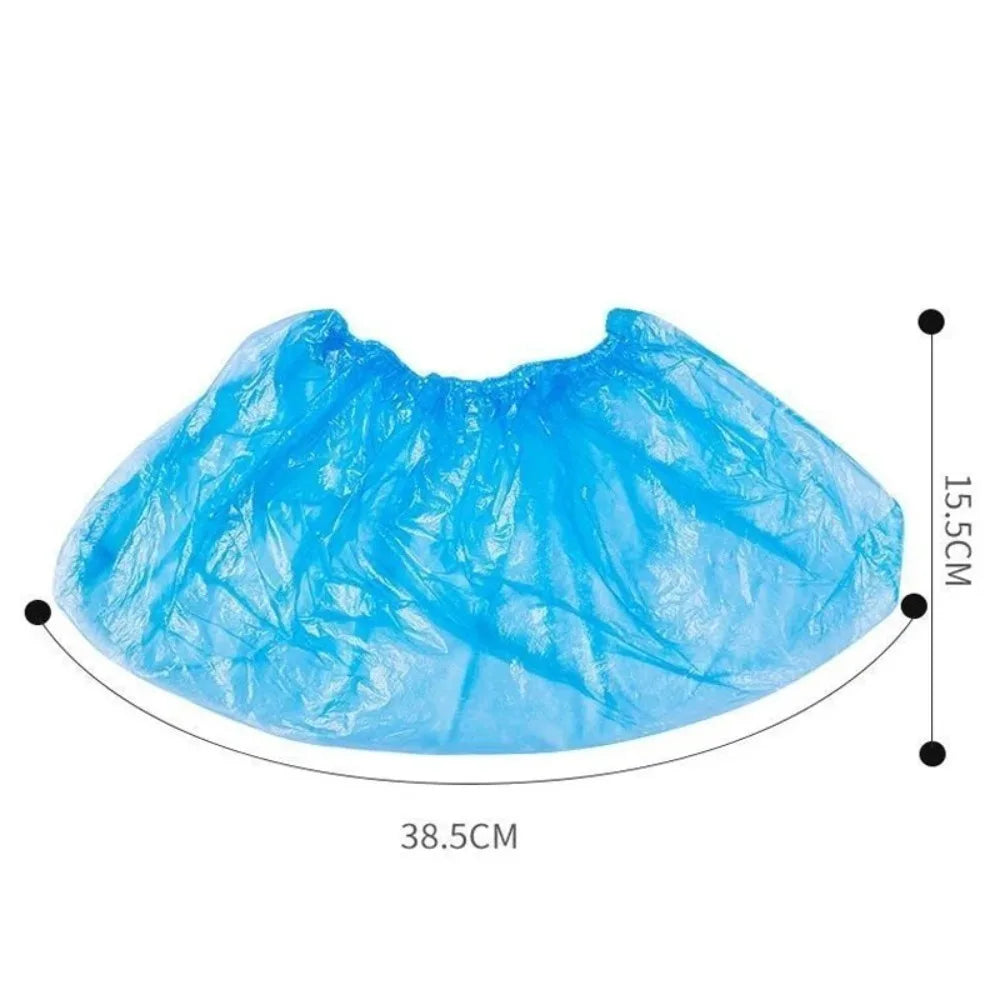 A translucent blue reusable waterproof plastic shoe cover laid flat.