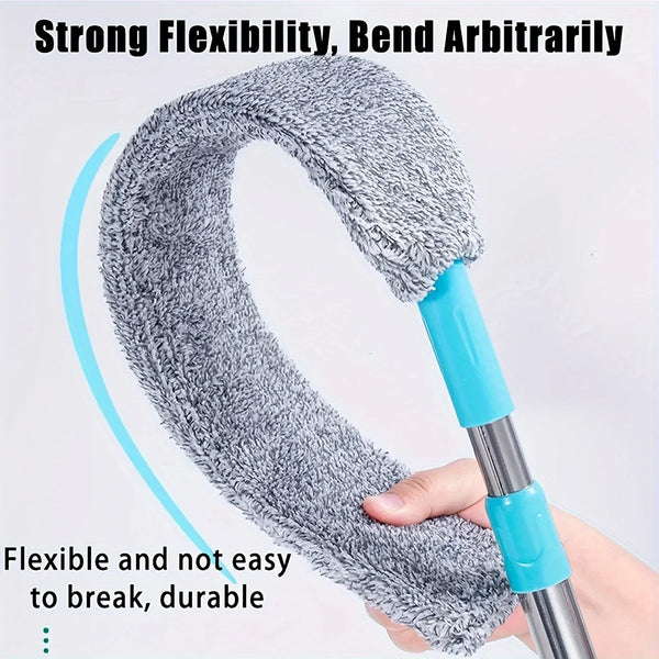 A hand is holding a flexible, gray duster with a blue handle, demonstrating its bendable and durable nature.