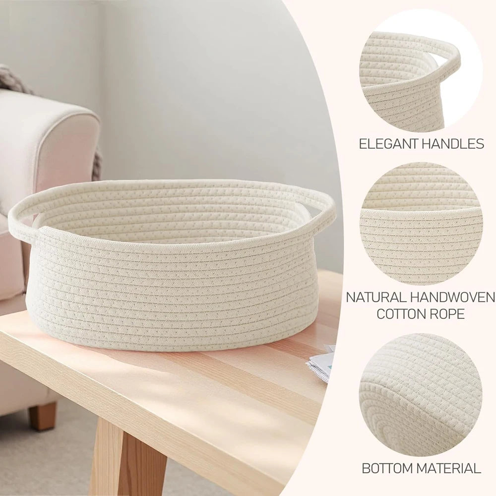 A beige handwoven rope storage basket with handles, showing its texture and natural cotton rope material.