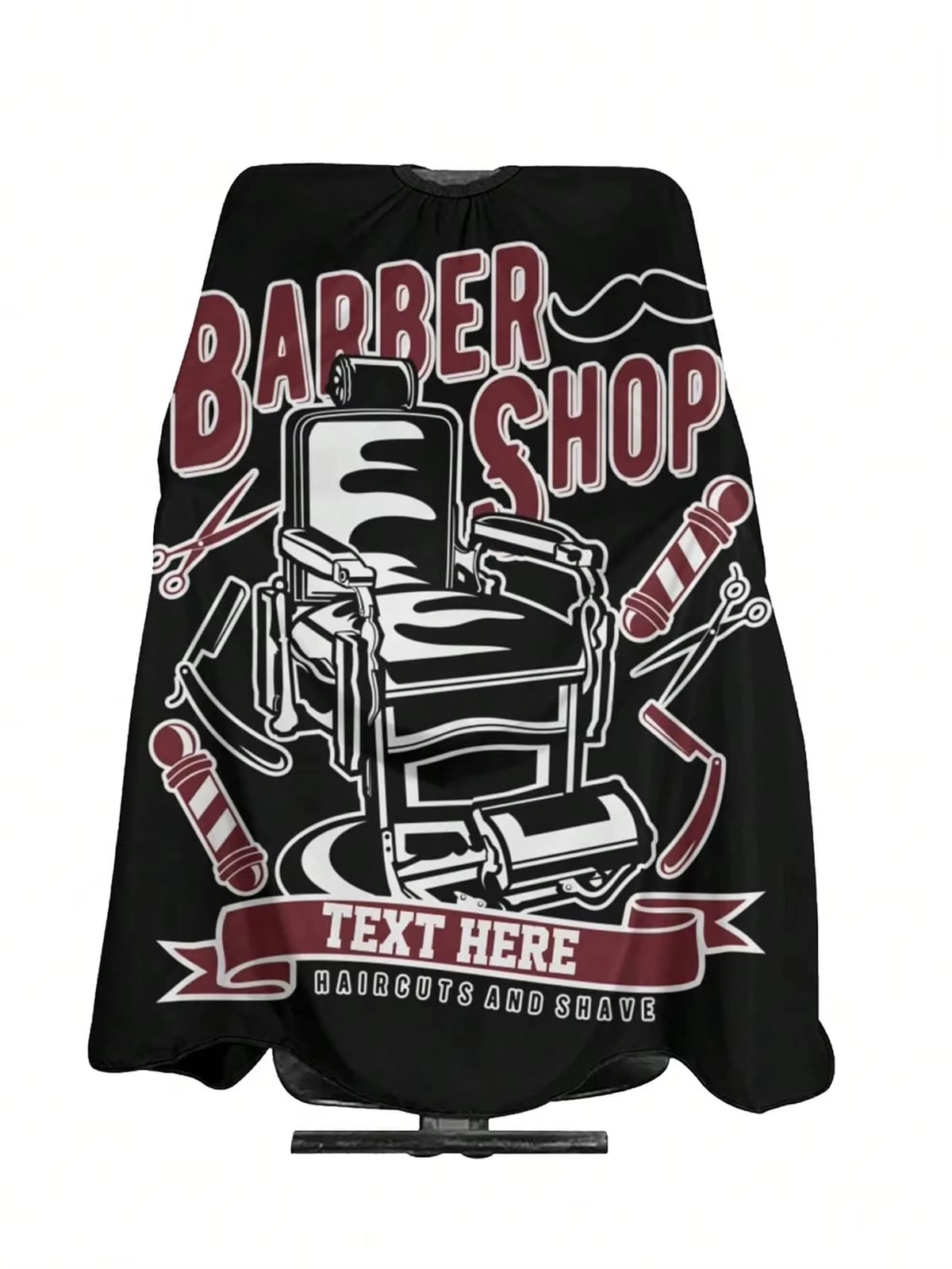 Black cape featuring a barber shop design with text that reads TEXT HERE HAIRCUTS AND SHAVE