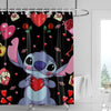 A black shower curtain featuring a design of a cute blue animal with red hearts and floral elements.