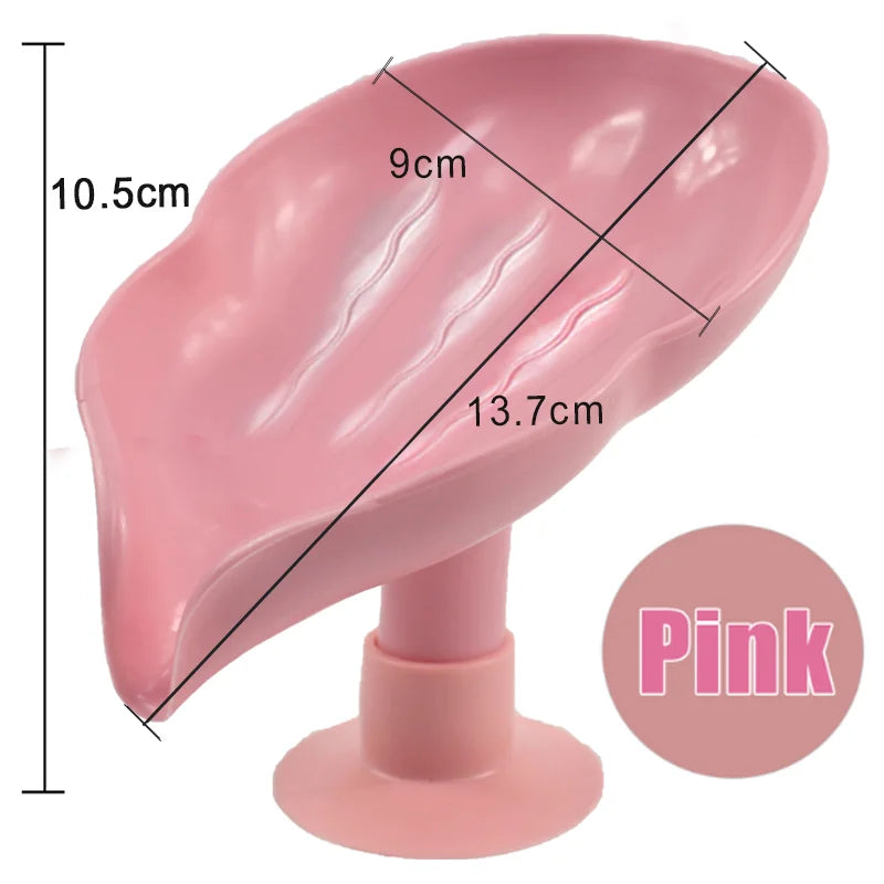 Pink leaf-shaped suction cup soap dish with measurements and a pink circular swatch.