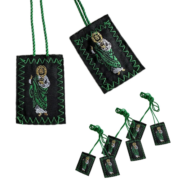 A set of three green scapular necklaces featuring Saint Jude and Virgen De Guadalupe figures on black fabric.