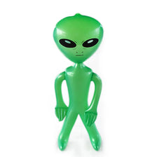 Décoration inflable d'alien vert vif avec de grands yeux noirs et un corps humanoïde.