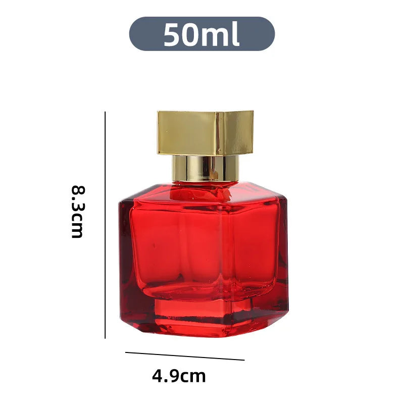 A clear glass perfume bottle with a red liquid and a gold cap, shown next to a measurement scale.