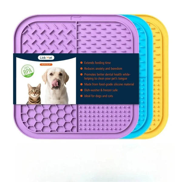 A set of silicone lick mats in purple, blue, and yellow for dogs and cats.