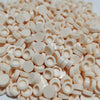 A pile of round, light beige and white building blocks for DIY projects.