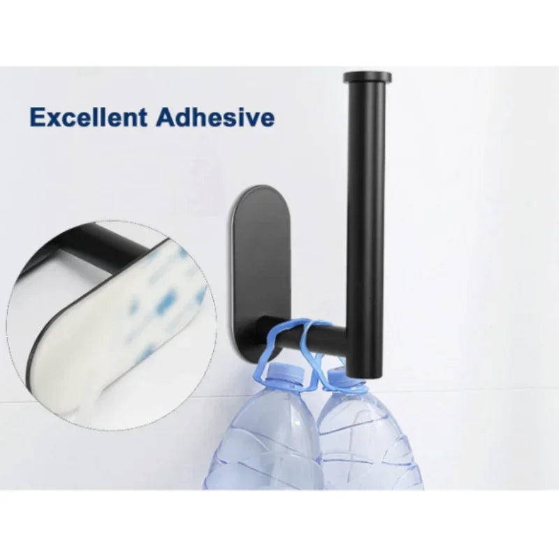 A black wall-mounted toilet paper holder is shown with a white paper towel, demonstrating excellent adhesive.