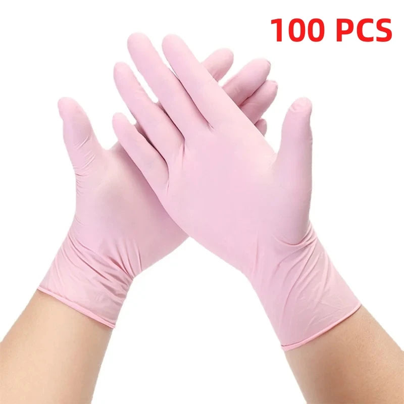 A pair of light pink disposable nitrile cleaning gloves shown on a hand, with the text 100 PCS visible.