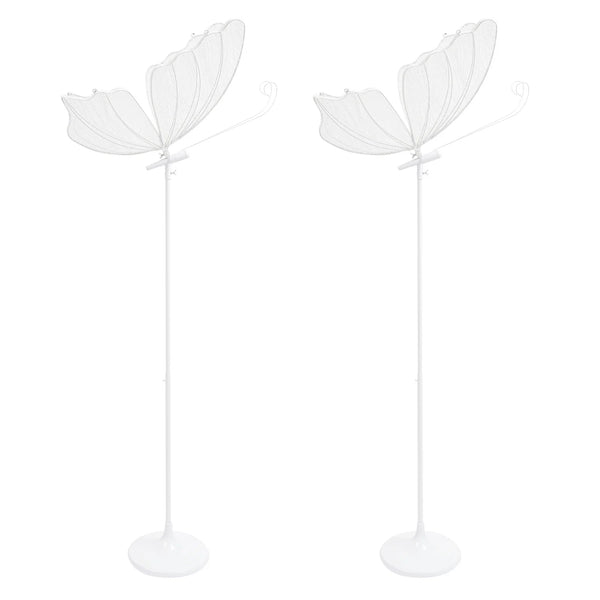 A set of romantic butterfly LED floor lamps with white stems and translucent fabric wings.