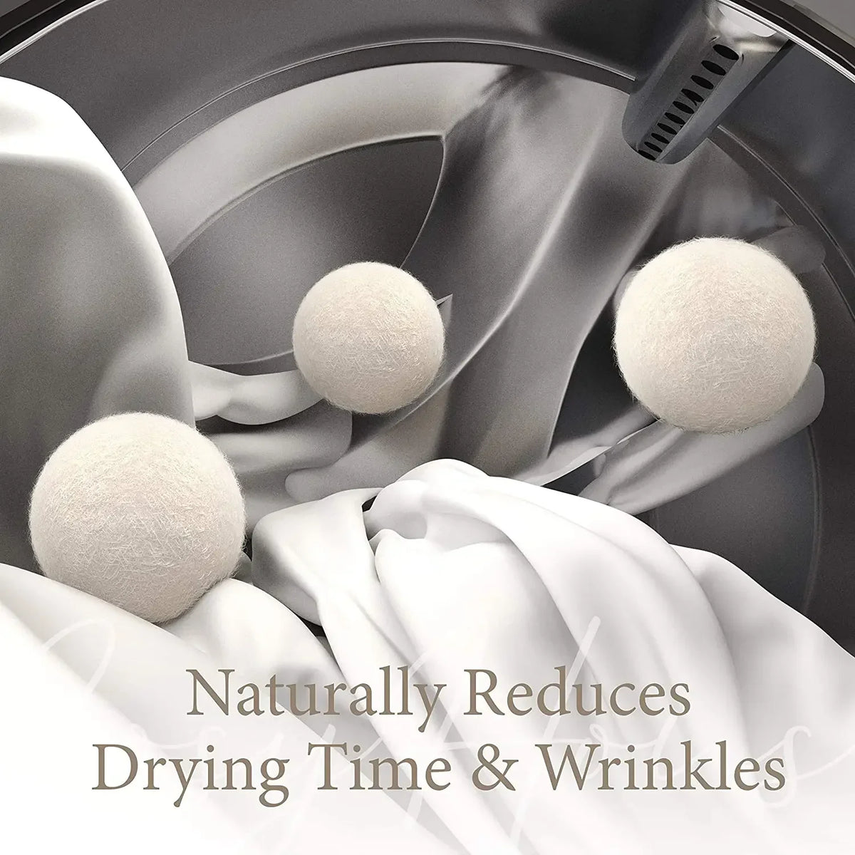 Reusable wool dryer balls inside a washing machine drum surrounded by white fabric.