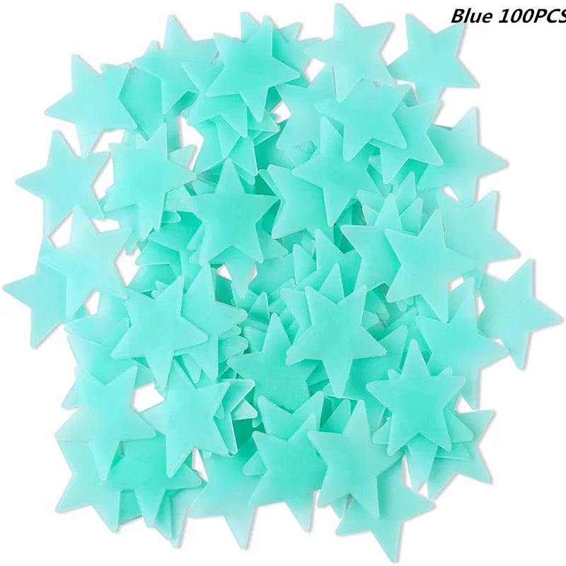 A pile of light blue glow in the dark 3D star wall decals.