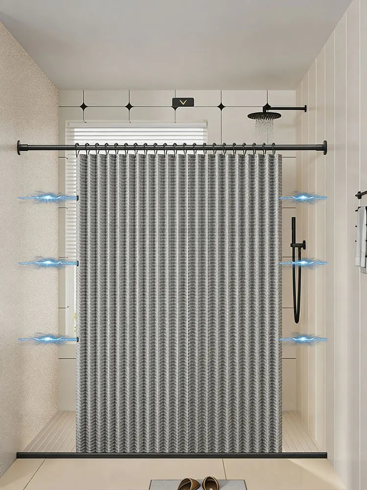 A gray magnetic shower curtain with a waffle texture hanging in a bathroom.