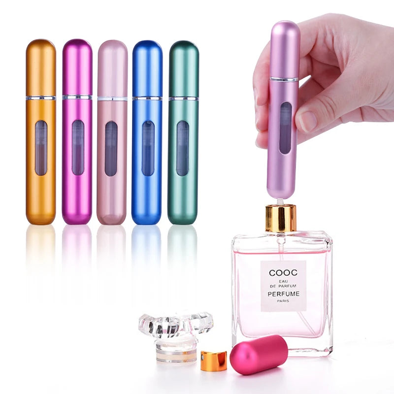 A hand holds a pink perfume bottle and five matching refillable spray bottles in various colors like gold, purple, and green.