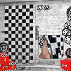 Black and white checkered foil curtain backdrop with racing tire accents and a red box.