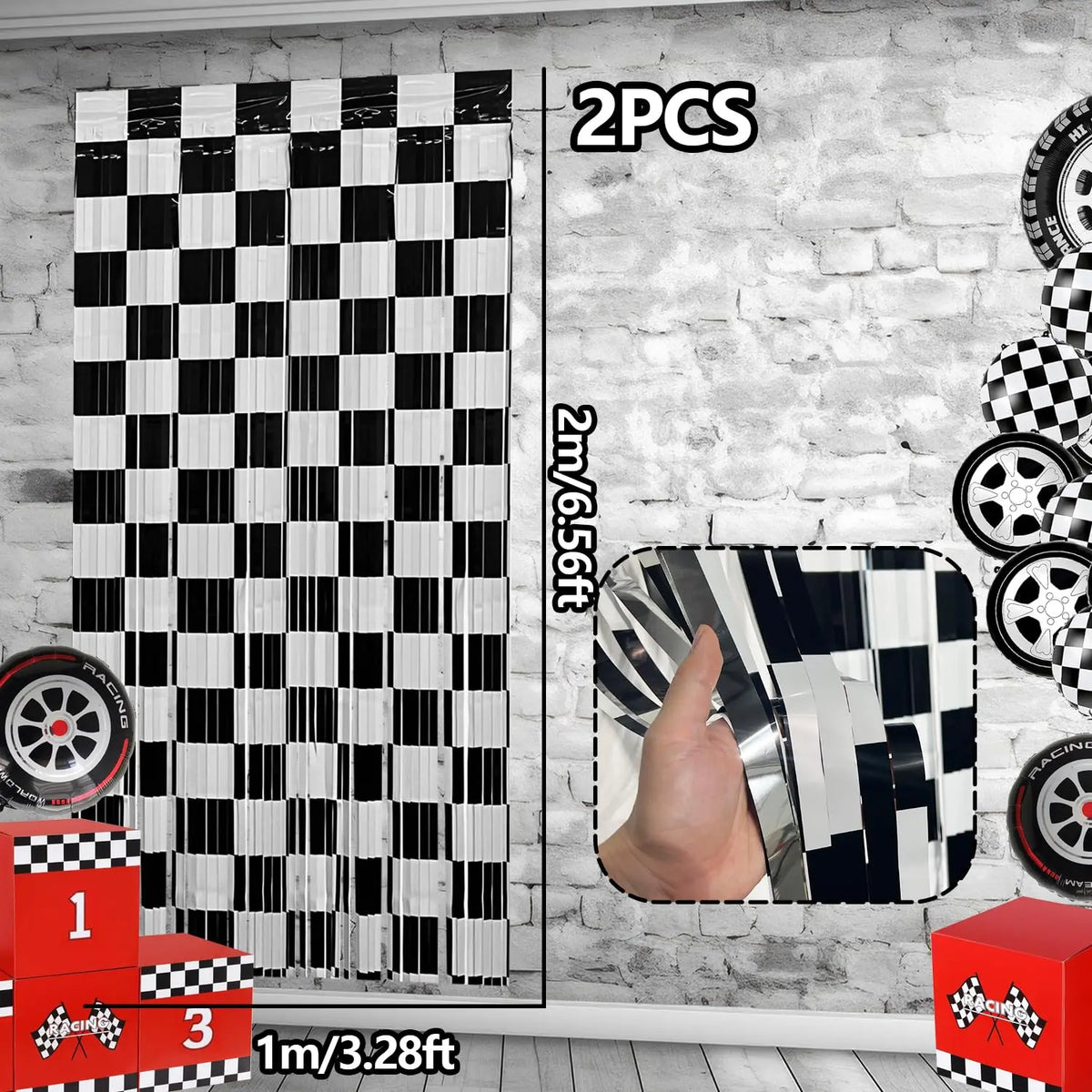 Black and white checkered foil curtain backdrop with racing tire accents and a red box.