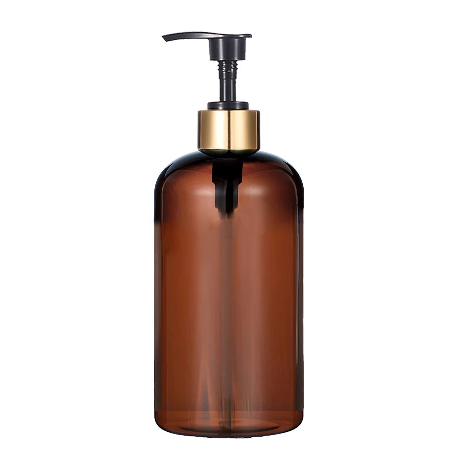 A brown glass refillable pump soap dispenser bottle with a gold-colored pump top.