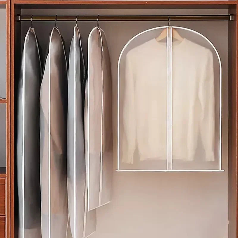 A beige washable clothes hanging dust cover is displayed on a wooden rack.