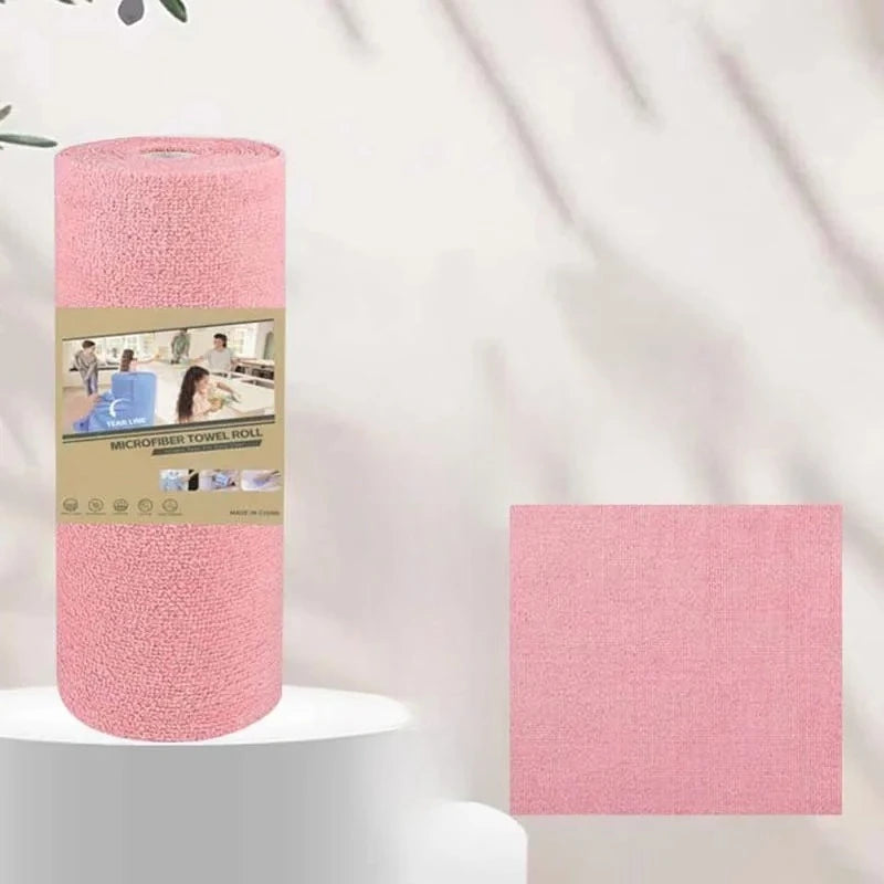 A roll of pink microfiber tear-off cleaning cloth towels displayed next to a swatch of the same fabric.